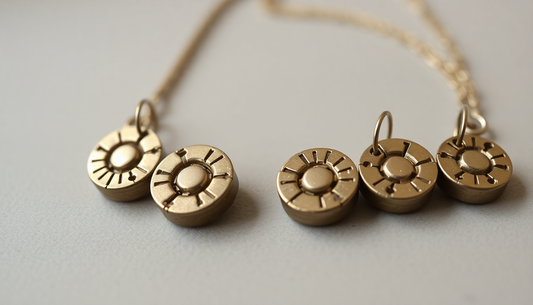 Brass bullet casing necklace featuring round pendants, showcasing why is bullet jewelry popular